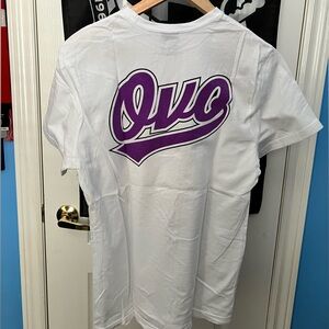 White OVO Athletics t-shirt with pink and purple owl graphics